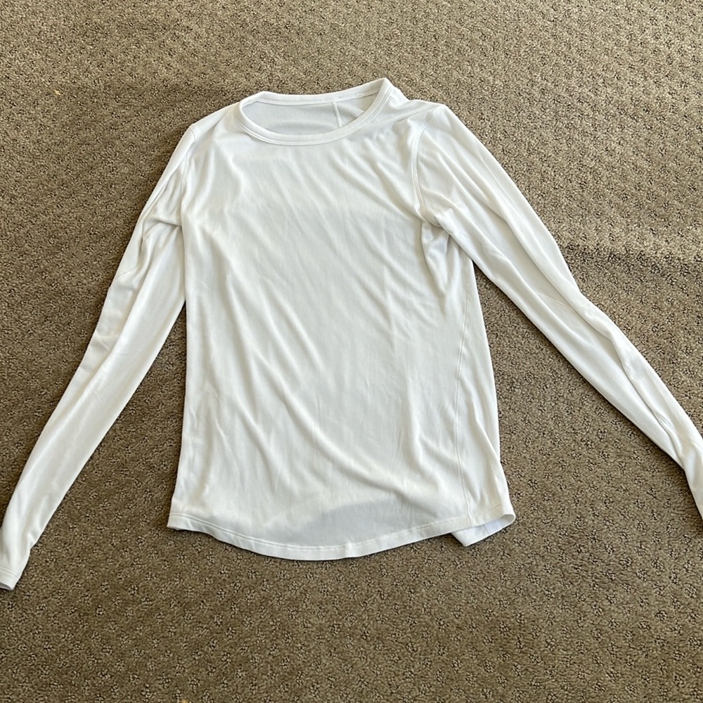 White lululemon size 8 long sleeve shirt never worn